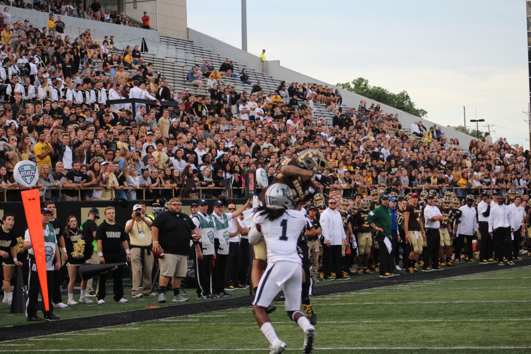 Fans look on as redshirt-freshman Dashon Bussell fights for the jump ball